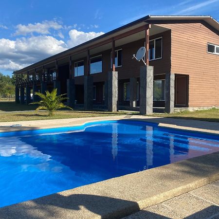 Отель Complejo Molco Sur Con Piscina Пукон Экстерьер фото